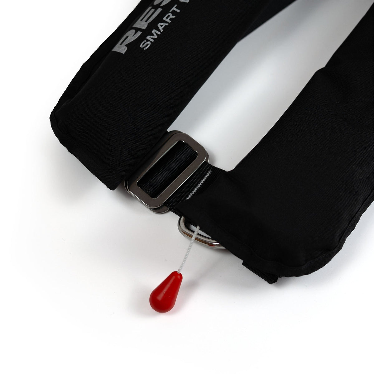 RESTUBE Lifejacket SAIL close-up of metal buckle and red pull trigger automatic inflation mechanism Philippines