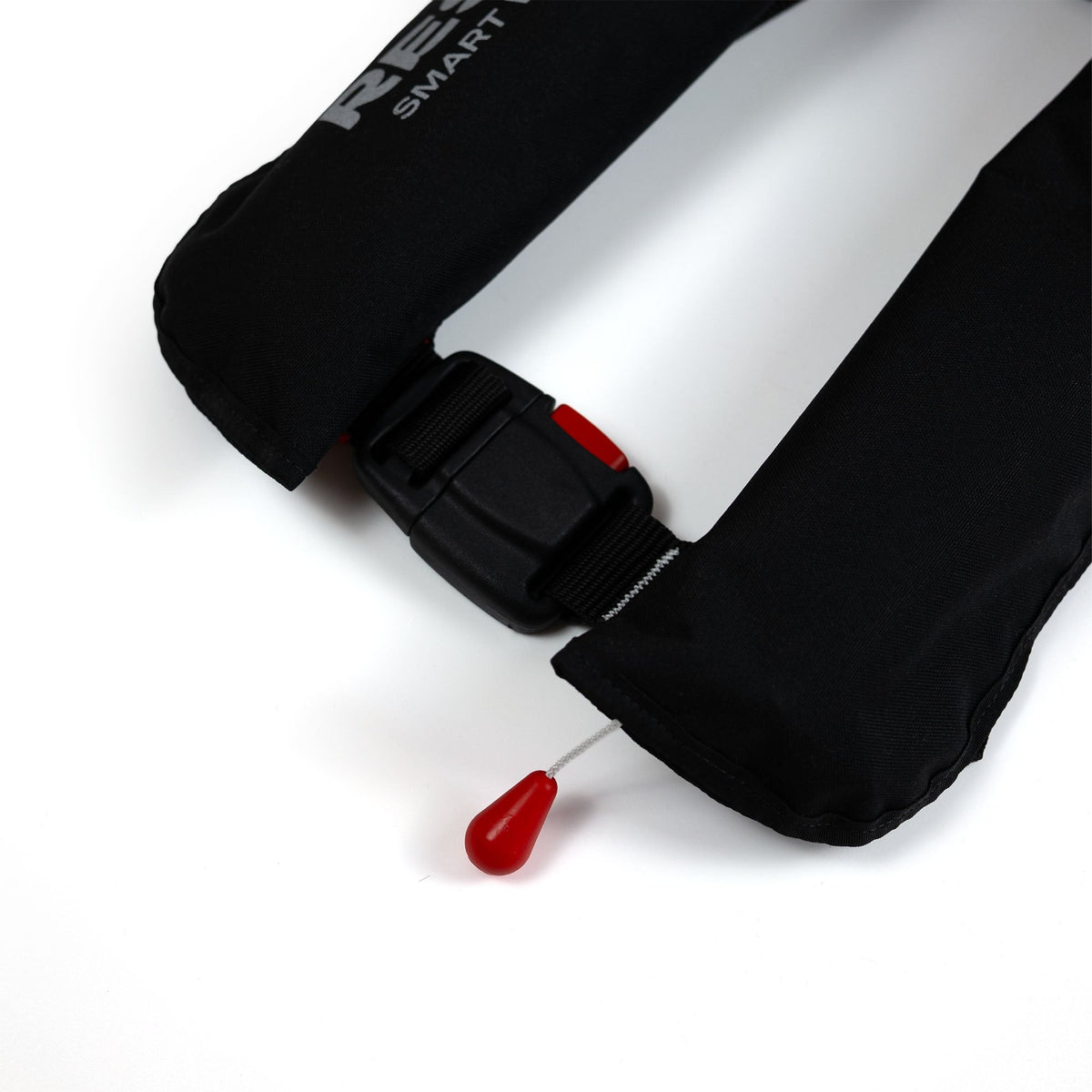 RESTUBE Lifejacket BOAT close-up of plastic buckle and red pull trigger automatic inflation mechanism Philippines