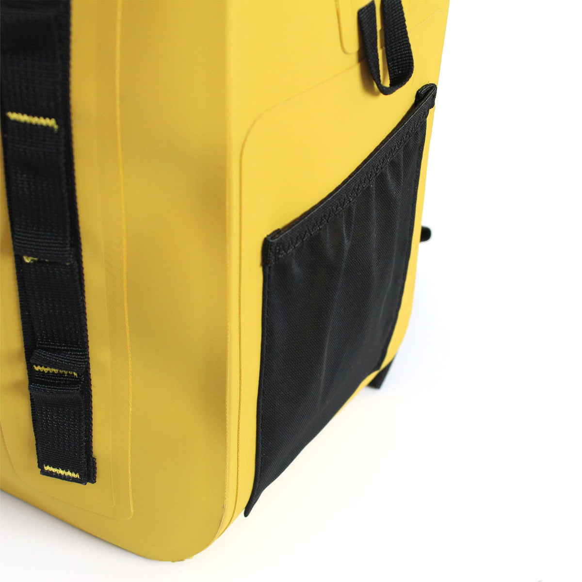Close-up of elastic side pocket on RESTUBE OCEAN 28L yellow backpack for carrying a water bottle Philippines