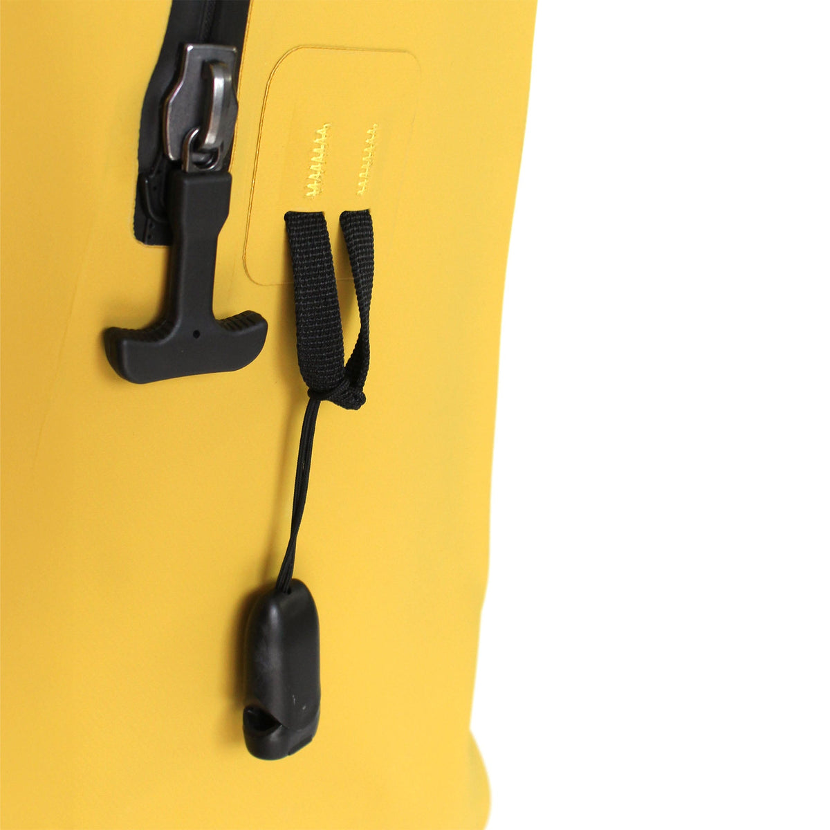 Close-up of Smart Loop System attachment loop with integrated safety whistle on RESTUBE OCEAN 28L yellow backpack Philippines