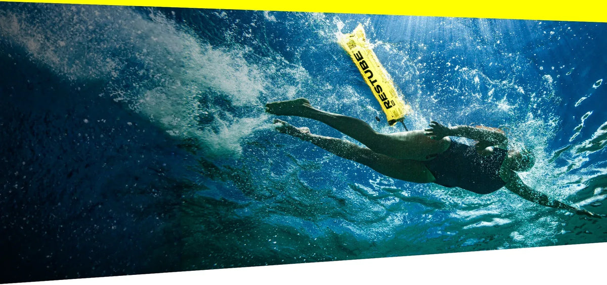 Open water swimmer with RESTUBE swim buoy - Swimming water safety Philippines